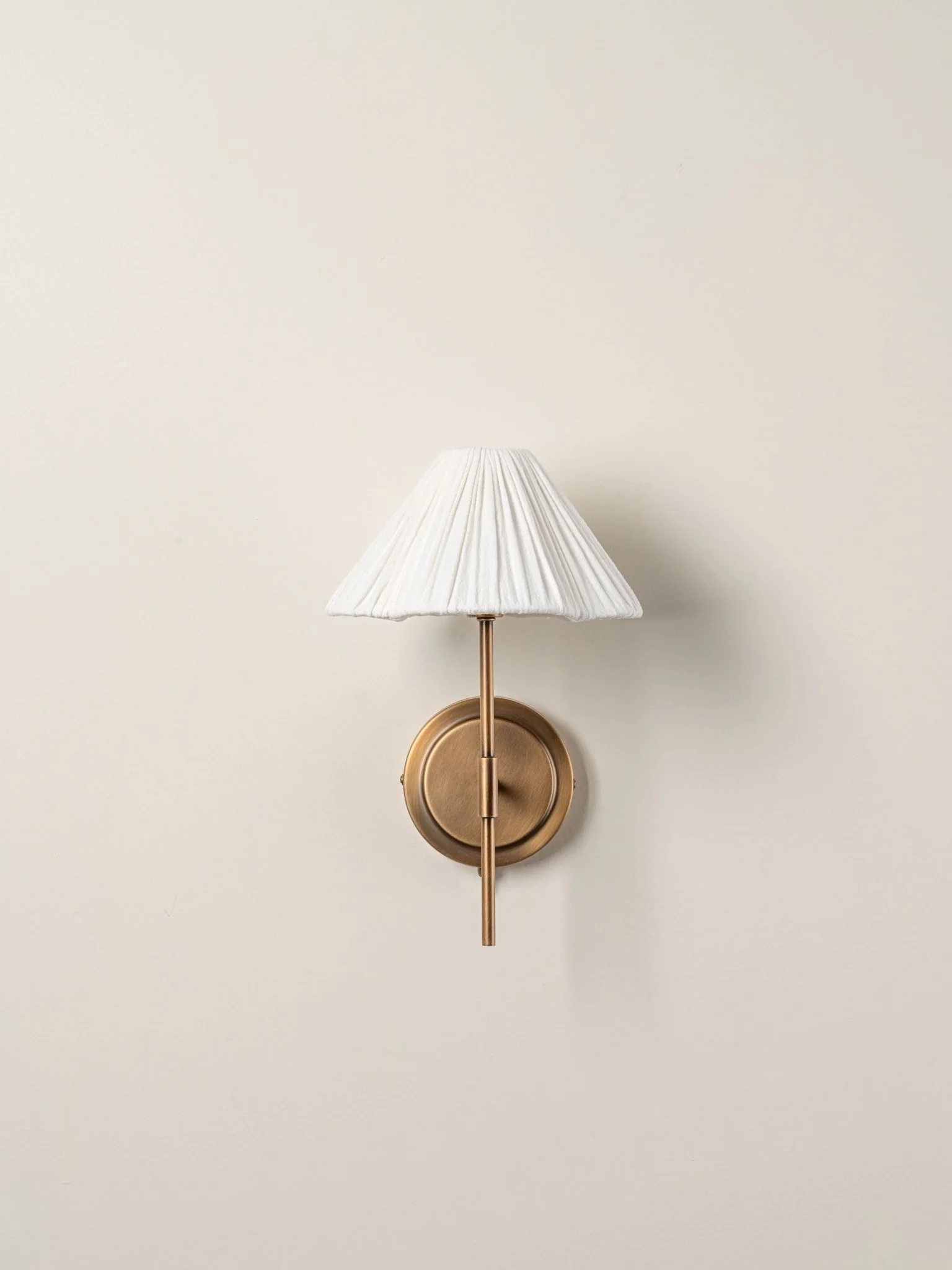 Lindi - Aged Brass And Linen Scalloped Wall Light